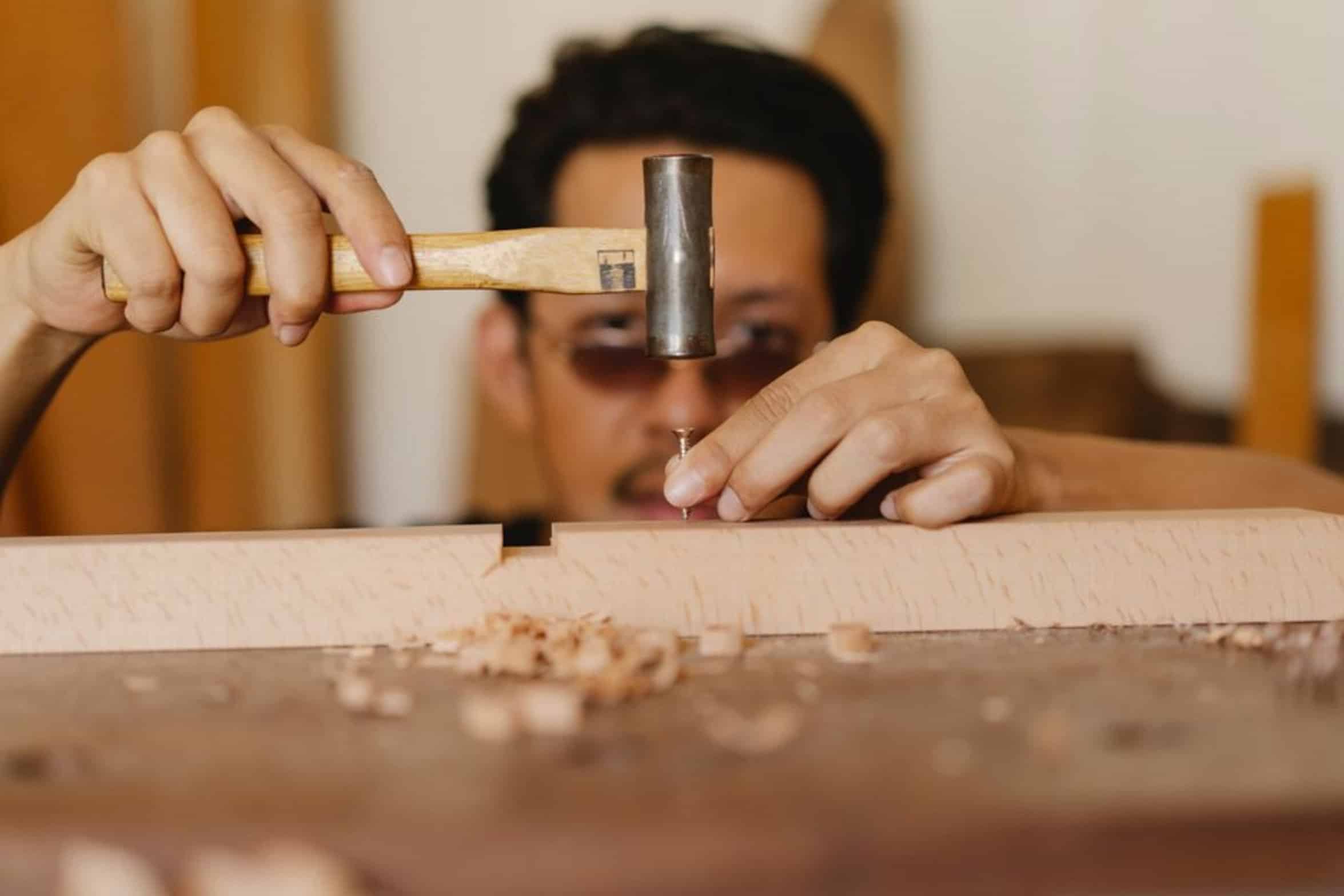 carpenter using stapler carpenter using stapler