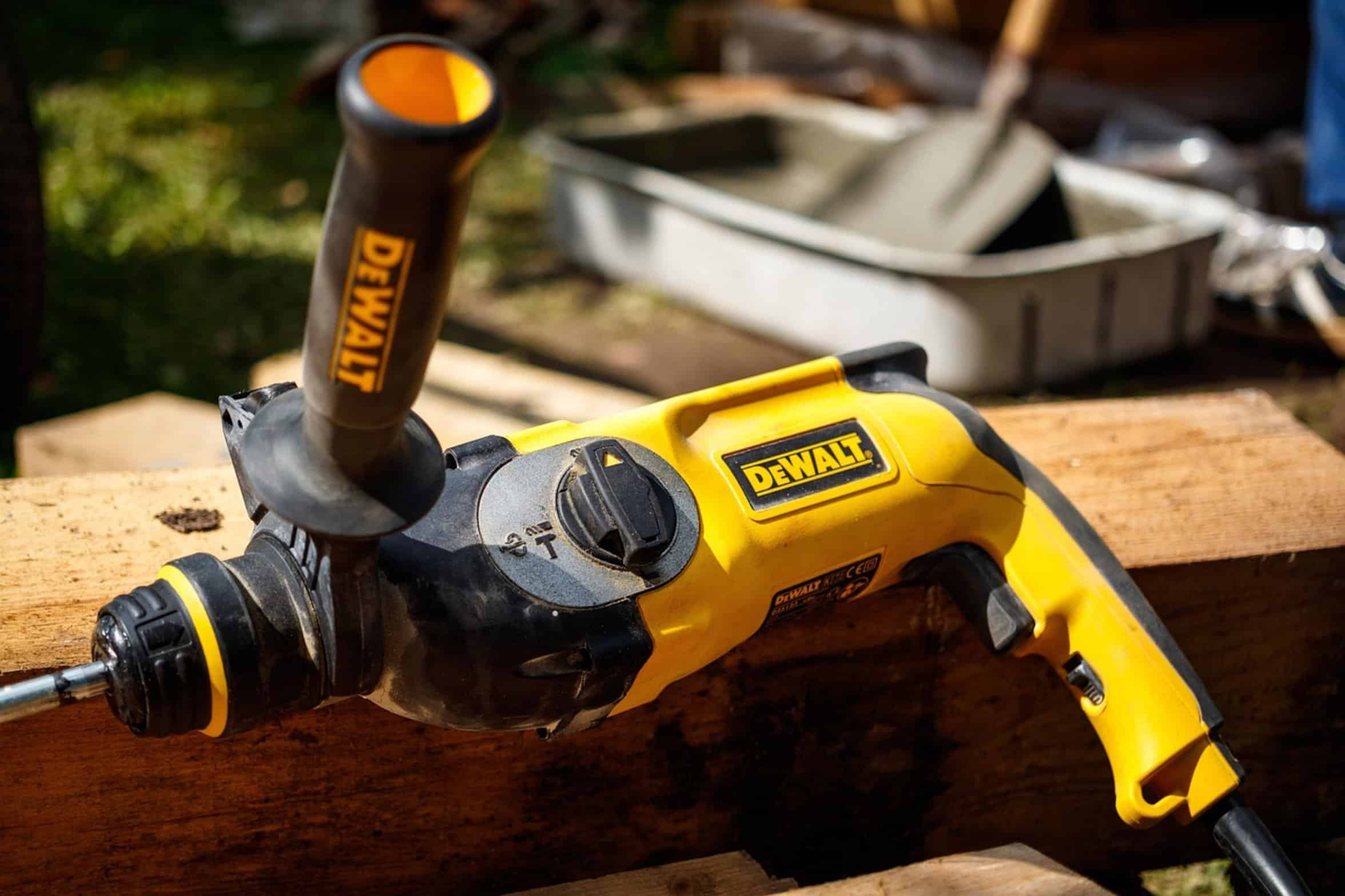 hand holding power drill hand holding power drill