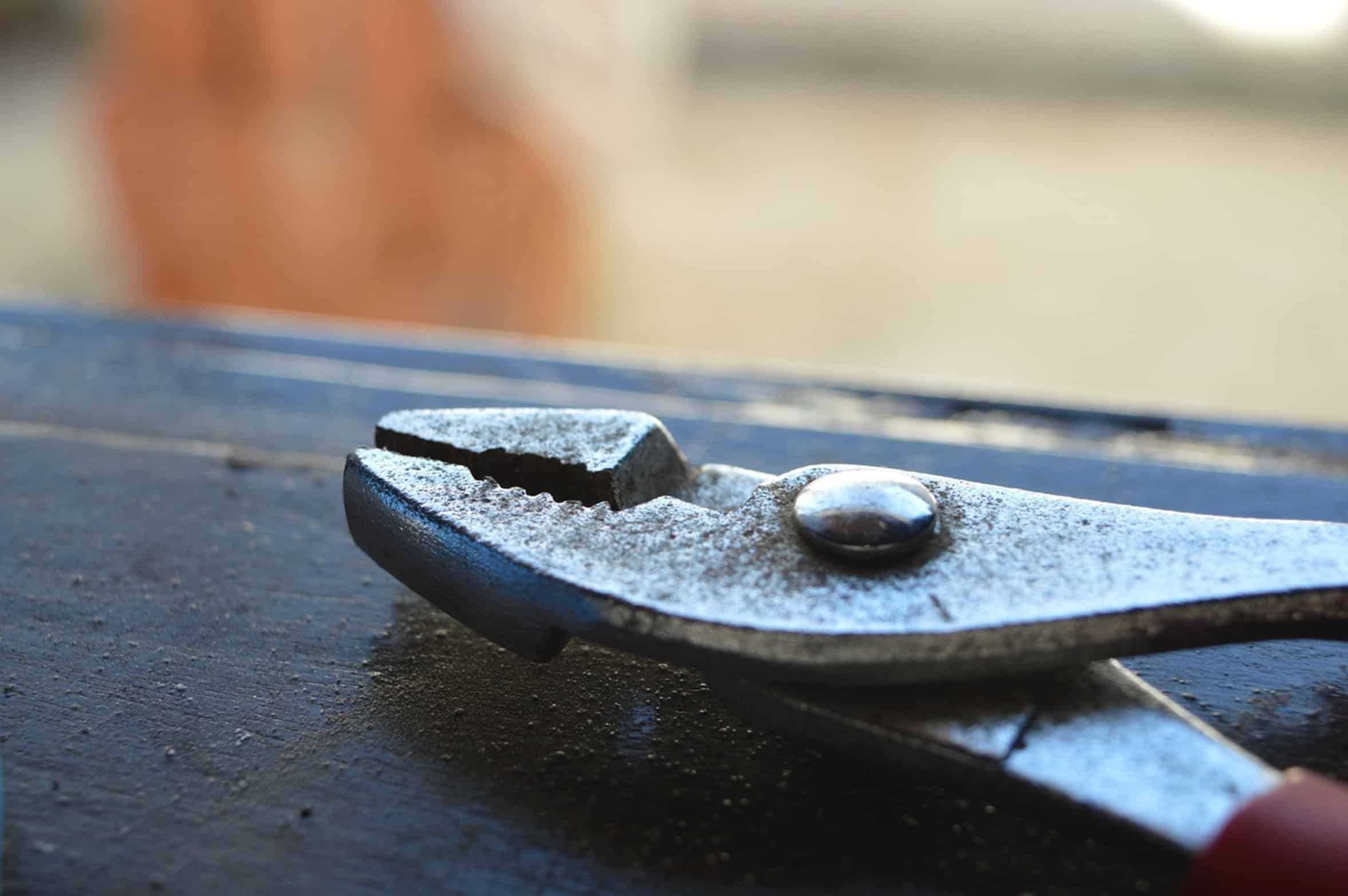 locking pliers gripping metal locking pliers gripping metal