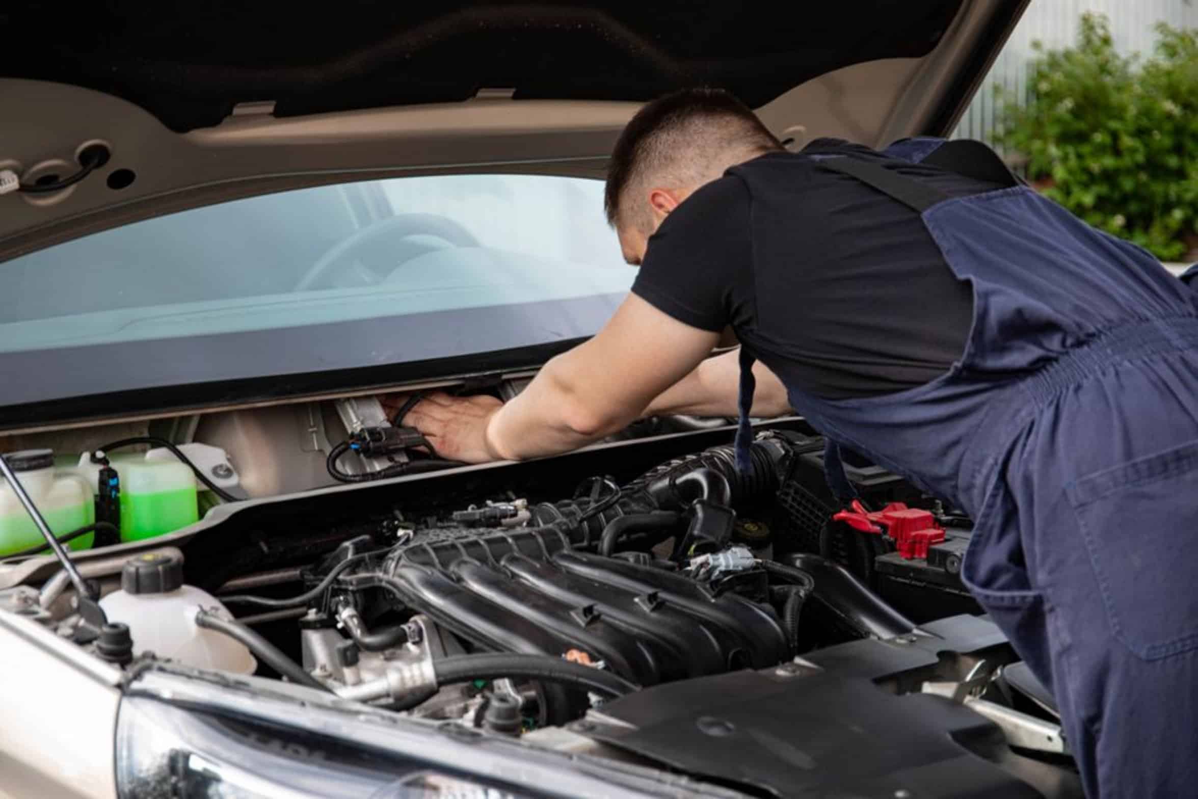 mechanic working on car mechanic working on car