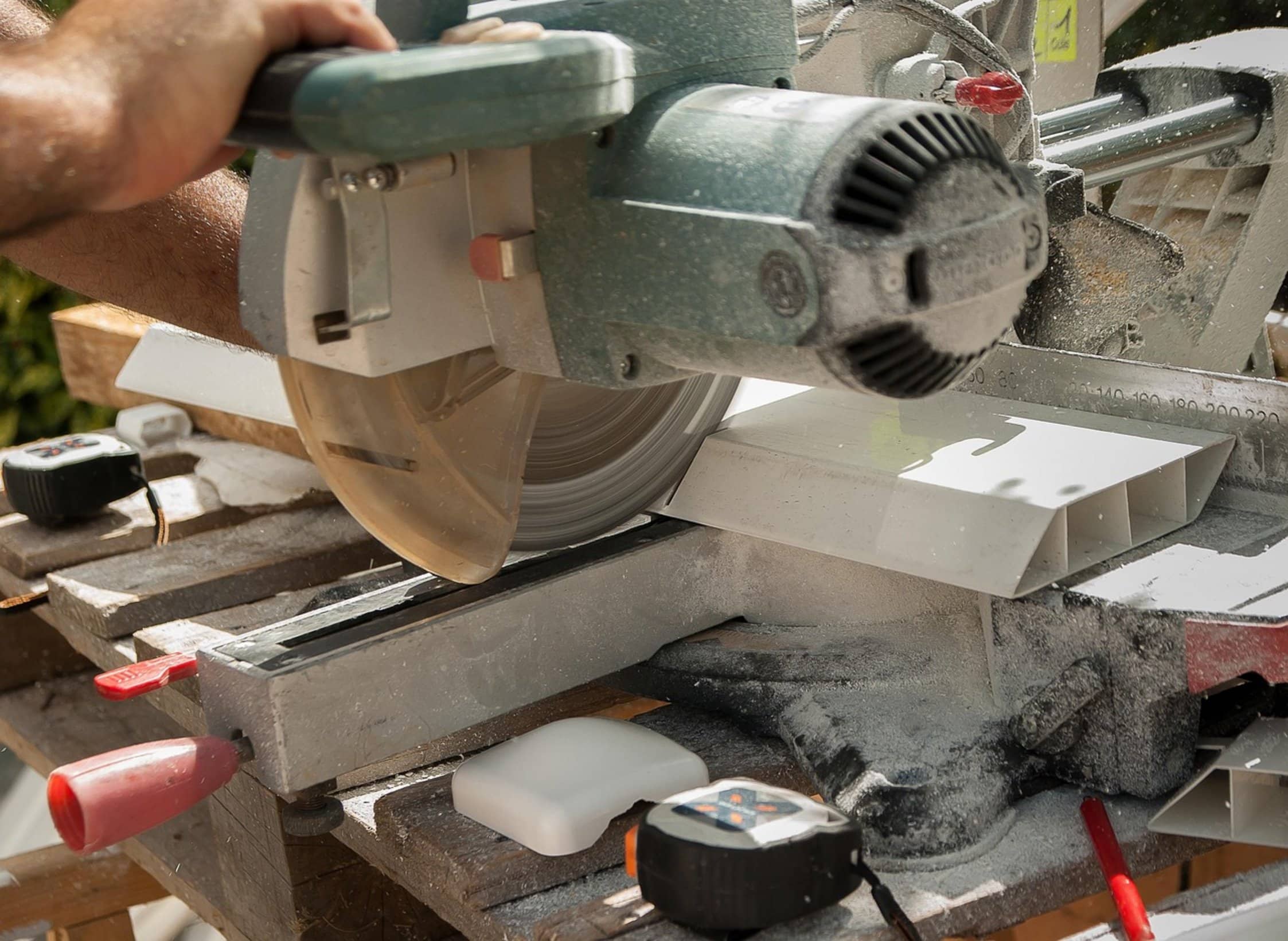 worker using reciprocating saw worker using reciprocating saw